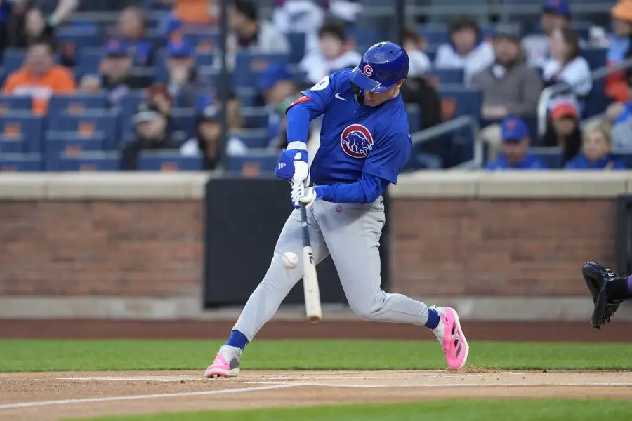 Chicago Cubs center fielder Pete Crow-Armstrong (4) hits a single against the New York Mets during the first inning at Citi Field.